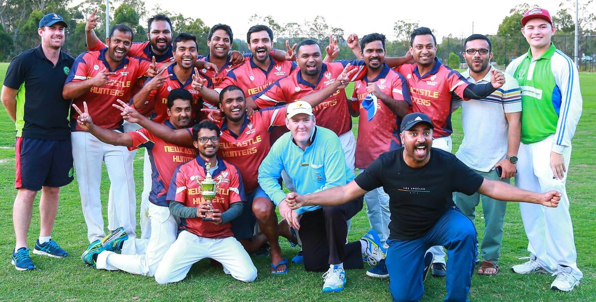 The Newcastle Hunters celebrate their T20 championship victory in 2017.