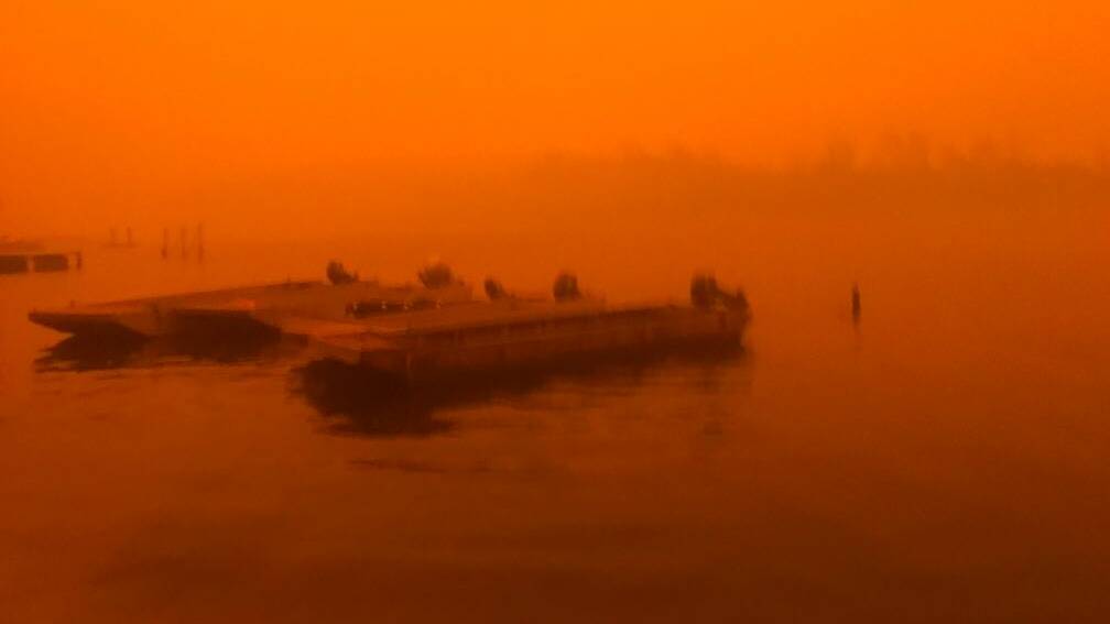 The glow of the Border Fire, as seen from Broadwater Oysters. Picture: Supplied