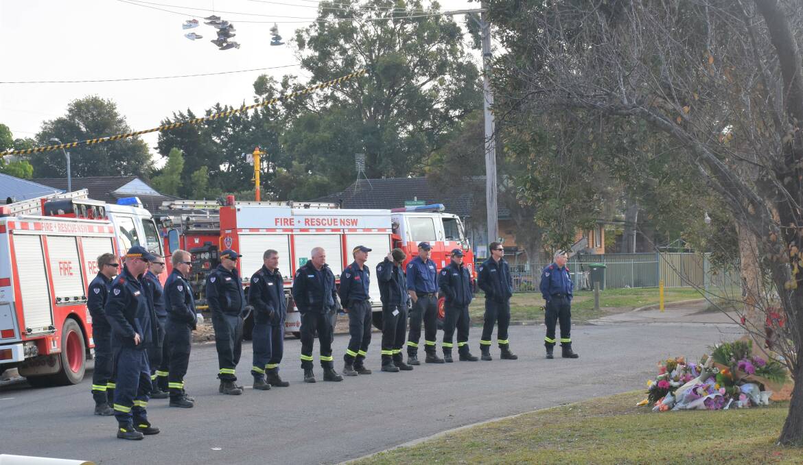 A MOMENT OF REFLECTION: Members from the Fire & Rescue NSW station 444 Singleton returned to Brittliffe Close at 9.45am today.