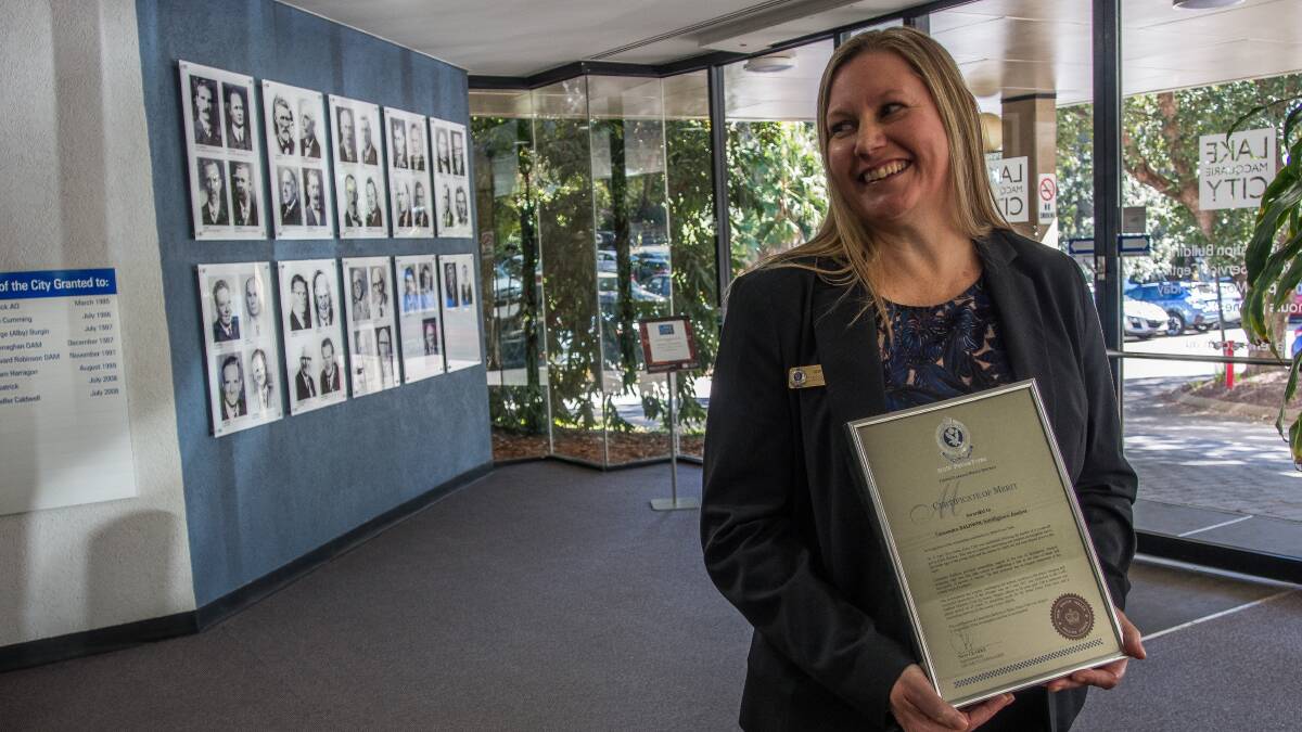 Recognition: NSW Police senior intelligence analyst Cassandra Baldwin with her award on Tuesday.