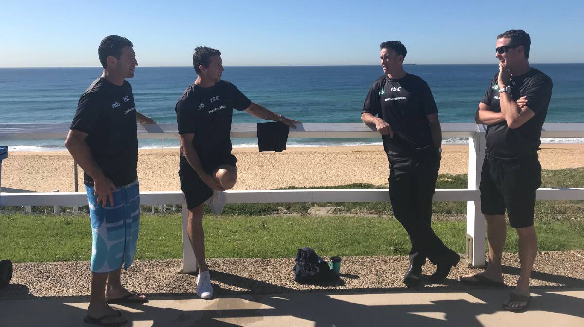 Home safe: Former Knights Danny Buderus, Kurt Gidley, Steve Crowe and Mark Hughes at Dixon Park Beach on Monday. Picture: Supplied