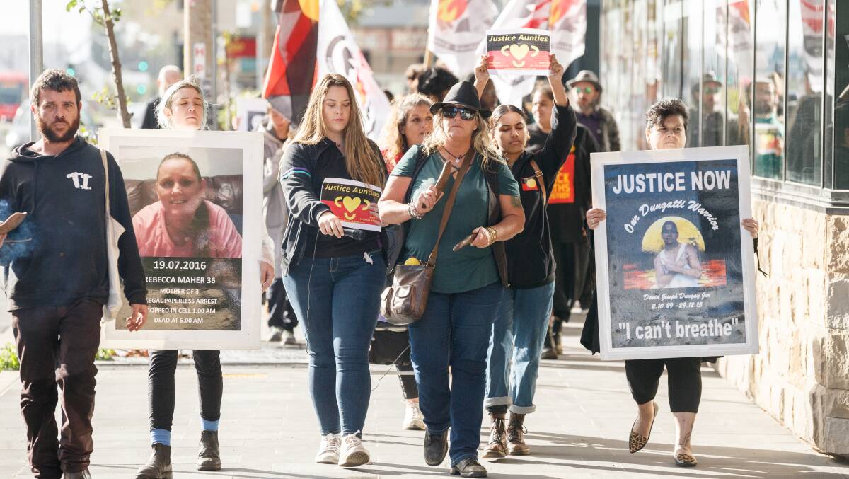 Protest: Supporters of Ms Maher marched from Civic Park to Newcastle Courthouse before the findings from the inquest into the Wiradjuri woman's death were handed down. Picture: Max Mason-Hubers