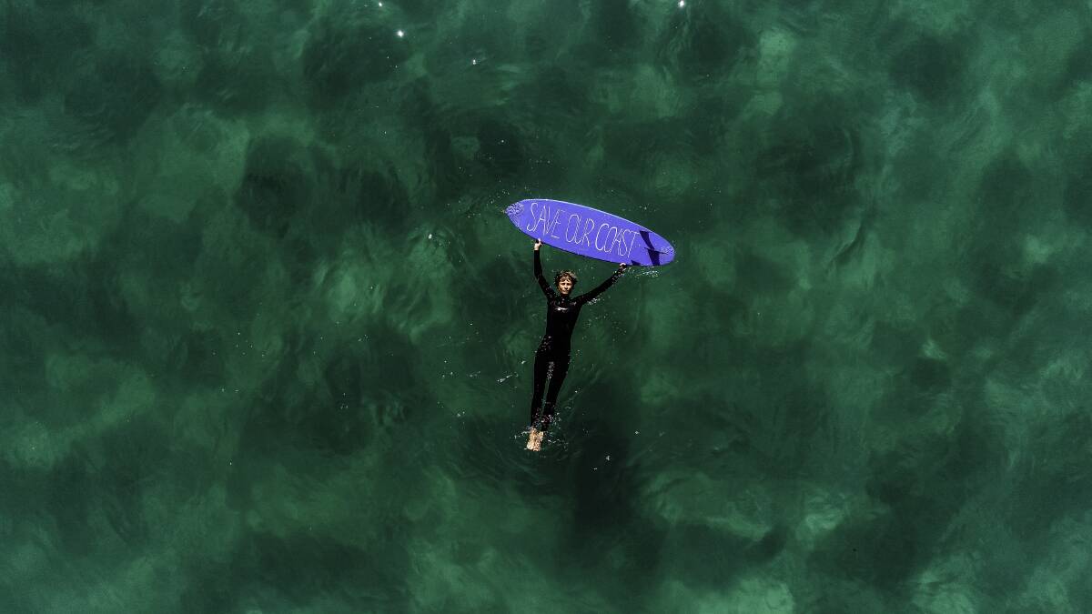 Sending a message: A still from the documentary made by Newcastle-raised surfer Belinda Baggs. 