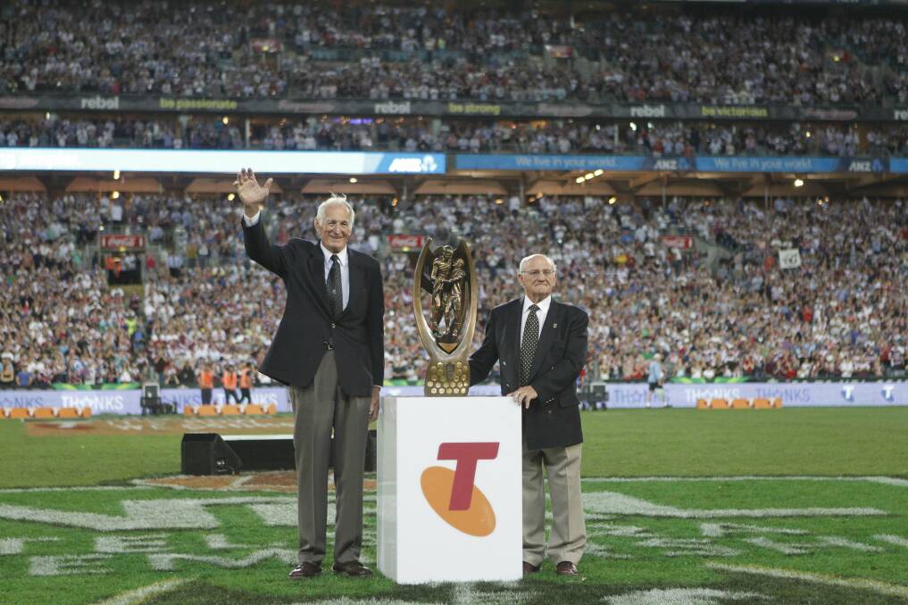 Legend: Norm Provan, pictured left with Arthur Summons at the 2013 NRL grand final, died last week. Picture: Jonathan Carroll
