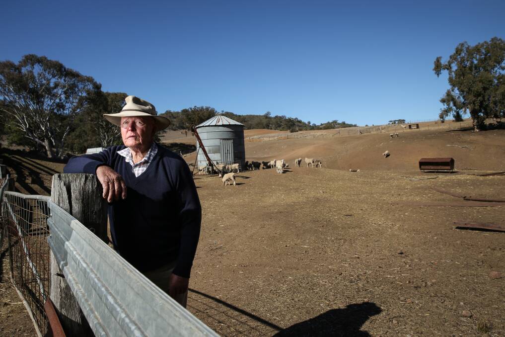 Family operation: Brian Hunt's farm has been in his family for 150 years. The 84-year-old has completely de-stocked of cattle and is spending thousands feeding his sheep, which are much less susceptible to drought conditions. Picture: Marina Neil