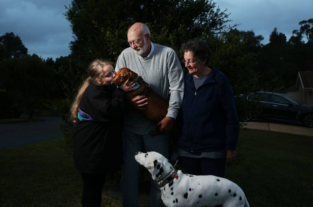 Family: Ray and Gail Jolliffe with granddaughter Sienna and two dogs Jasper and Nelson. Picture: Simone De Peak