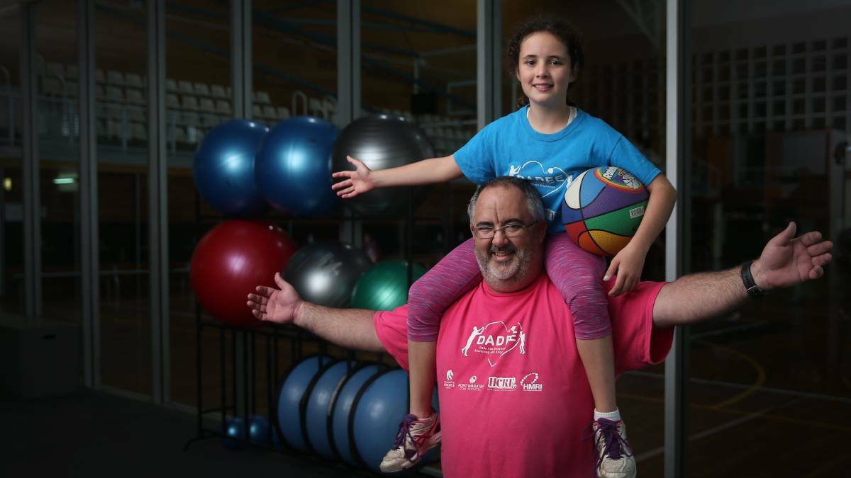 Mark Davison and daughter Gabby took part in the program in Newcastle earlier this year. Picture: Marina Neil