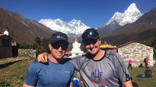 'Great challenge': Former Newcastle teammates Danny Buderus and Mark Hughes during the trek. Picture: Supplied