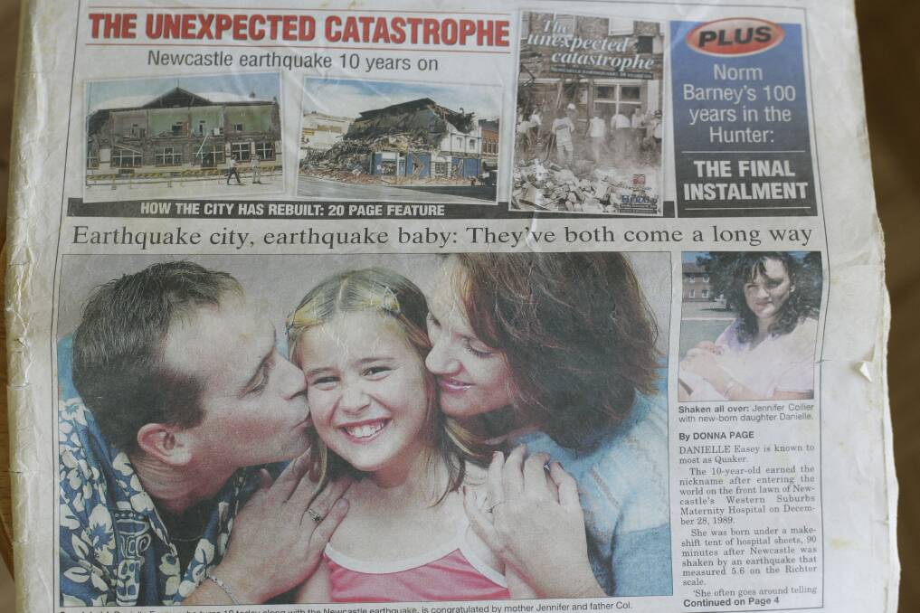A newspaper clipping from 1999 marking a decade since the Newcastle earthquake and 10 years since Danielle Easey was born. Danielle's mum Jennifer and dad Colin are pictured with her on the page.