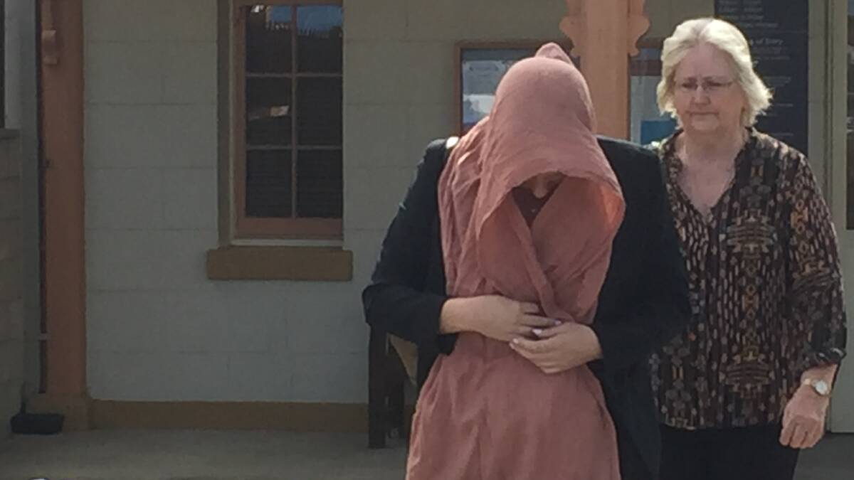 Convicted: Caroline Ashthore Throwden (wearing a head covering) leaving court in April.
