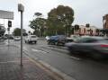 Changes: The red light camera at the Hamilton intersection will be replaced with a newer piece of equipment, which will include a speed camera. Picture: Simone De Peak