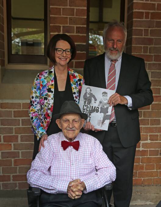 Looking back: Former Newcastle East principal Mervyn Hall with former prime minister Julia Gillard and then-principal John Beach at the school's 150th celebrations. Picture: Marina Neil