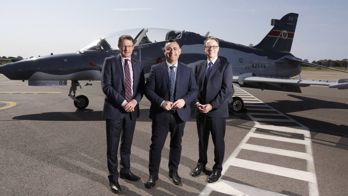 Airside: Parliamentary Secretary for the Hunter Scot MacDonald, Deputy Premier John Barilaro and Newcastle Airport CEO Peter Cock at the funding announcement on Wednesday.