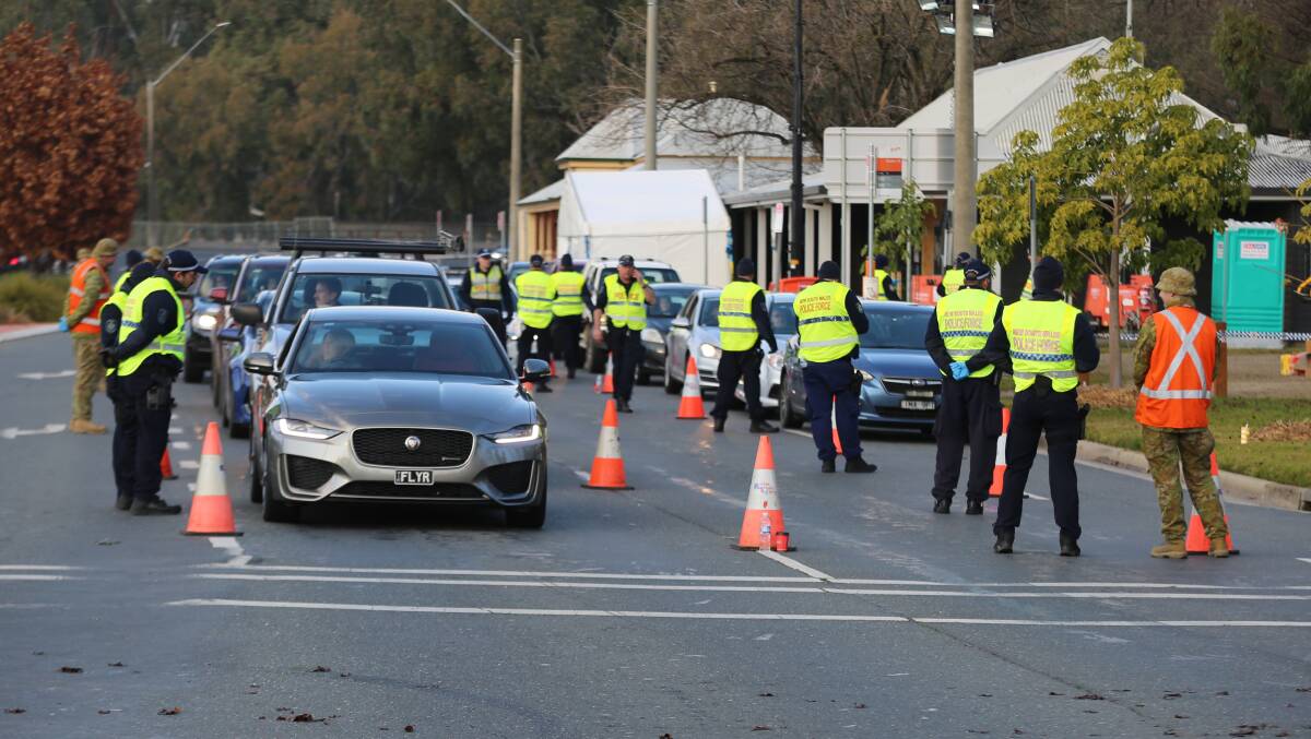 Closed: NSW Police checking vehicles in the border town of Albury on Thursday. Picture: NSW Police