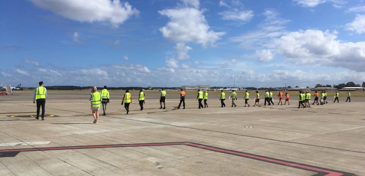 Teamwork: Newcastle Airport staff on the apron this week. Picture: Supplied