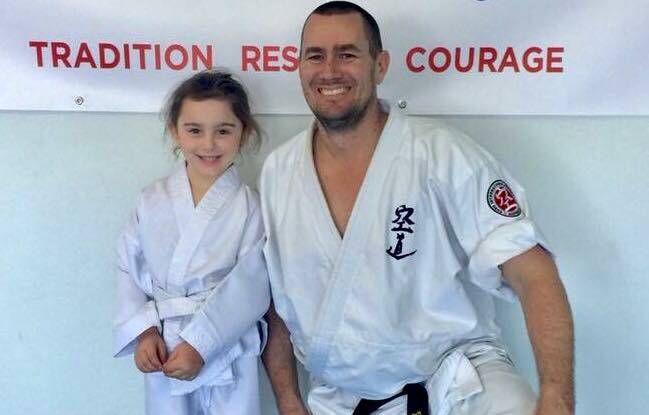 Life skills: Lily Edwards, 6, with Sempai (mentor) Josh Langworthy. Lily was Hunter Budokai's student of the year in 2018. 