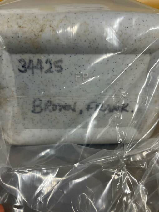 Washed up: An urn apparently containing the ashes of a cremated man has been found on the shore at Newcastle. Picture: NSW Police