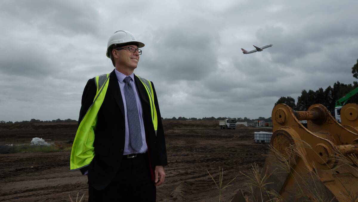 Newcastle Airport CEO Dr Peter Cock at the construction site of a new car park at the Williamtown facility. Picture: Max Mason-Hubers