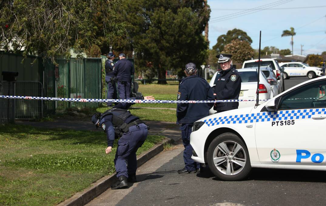Police at the roped-off scene at Segenhoe Street on Monday. Pictures: Simone De Peak