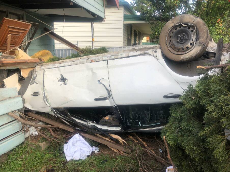 Car crashes into Telarah home. Pictures: NSW Ambulance