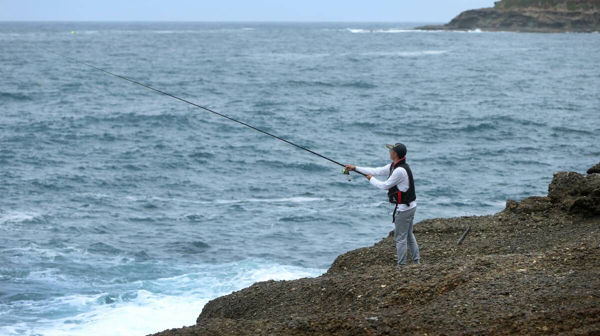 An angler rock fishing at Snapper Point earlier this year. Picture: Marina Neil