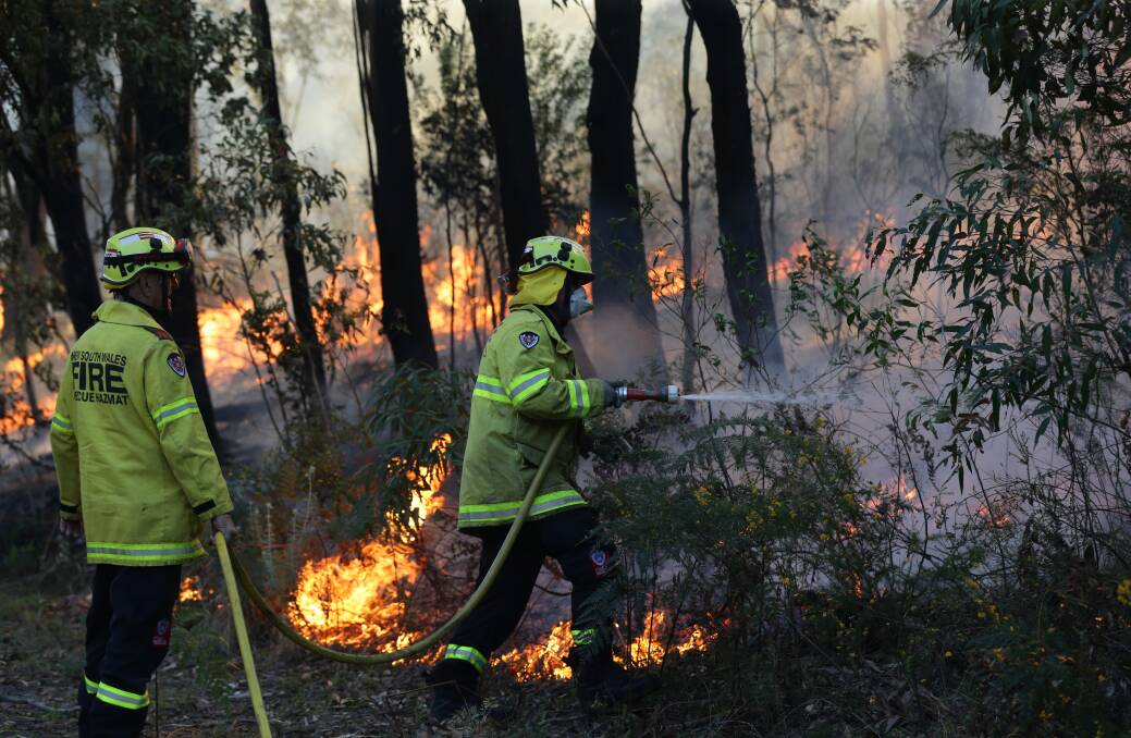 Preparing: Hazard reduction burning at Port Stephens Drive, Salamander Bay on Friday. Picture: Jonathan Carroll