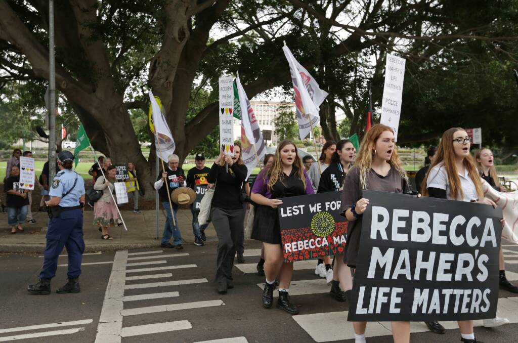March: Protesters make their way from Civic Park to Newcastle courthouse on Wednesday morning in support of Rebecca Lyn Maher, who died in Maitland police custody in 2016. Picture: Simone De Peak