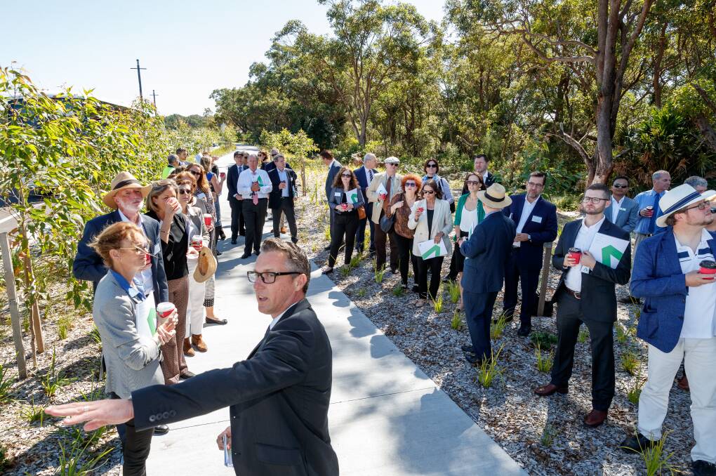 Trade mission: The group, including 14 ambassadors, hearing about the potential and significance of the Astra Aerolab development near Newcastle Airport. Picture: Max Mason-Hubers