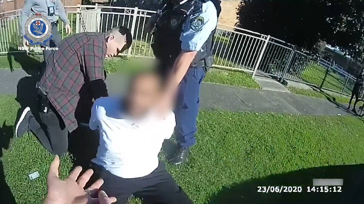 A screen grab from bodycam footage of the arrest.