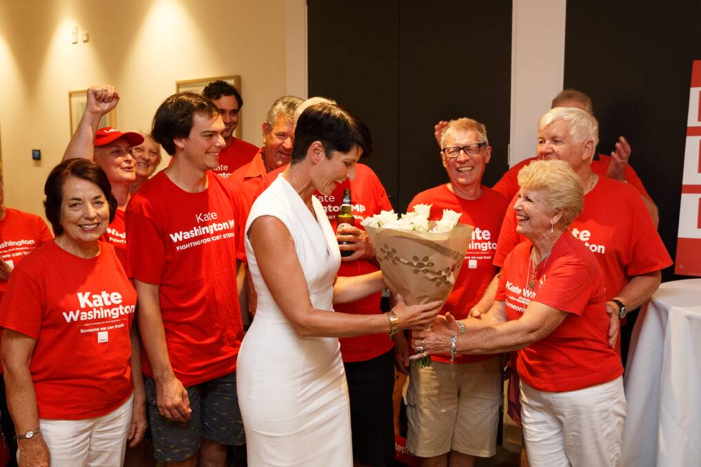 Second term: Port Stephens MP Kate Washington celebrates her re-election at Medowie after claiming victory on Saturday night. Picture: Max Mason-Hubers
