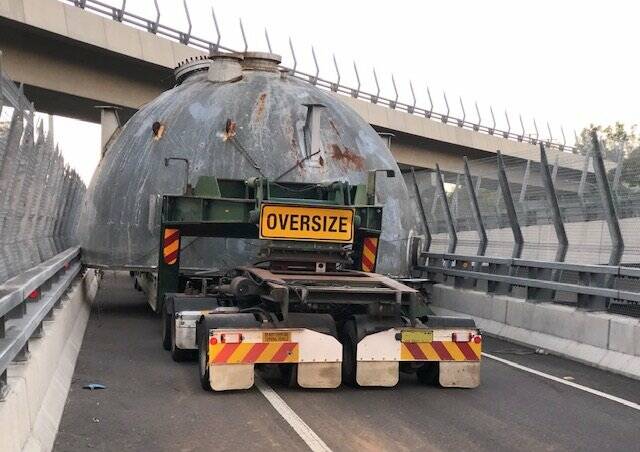 A salvage operation was required to free a prime mover carrying refinery equipment after it became stuck on an M1 Pacific Motorway off-ramp at Cameron Park on February 11. 
