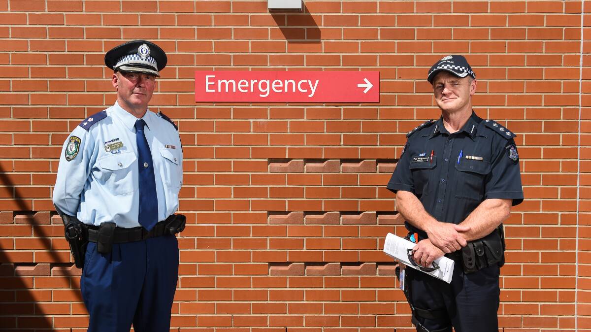 WORKING TOGETHER: Superintendents Paul Smith and Paul Hargreaves, from Albury and Wodonga, have both urged members of the public to adhere to the restrictions in place due to COVID-19. 