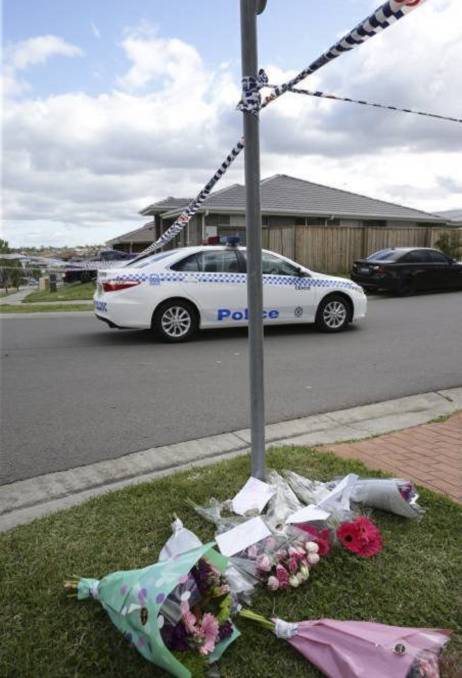 TRAGEDY: Flowers outside the 12-year-old girl's home after she was found dead in 2015. Her step-father was jailed for an additional three years on Monday. 