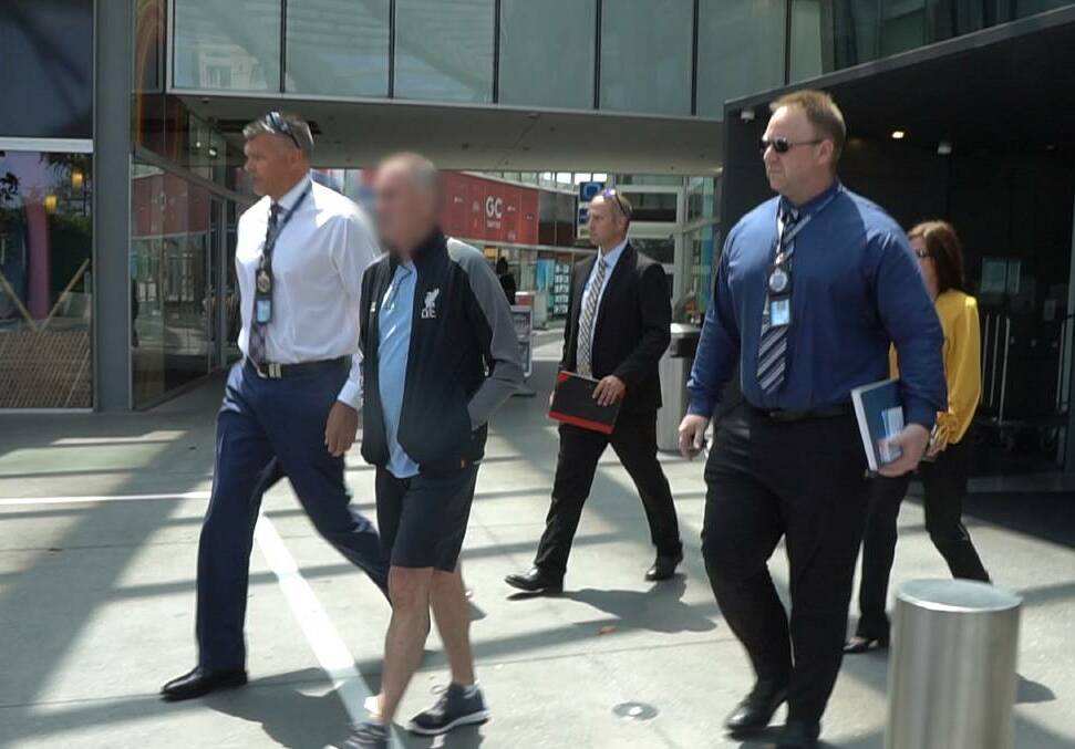 ACCUSED: Warren John McCorriston after his arrest in Surfers Paradise in January. Picture: NSW Police 