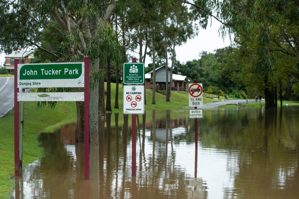 LAKE: John Tucker Park at Paterson was underwater on Saturday afternoon as the nearby Paterson River peaked at nearly 11 metres. Picture: Marina Neil 