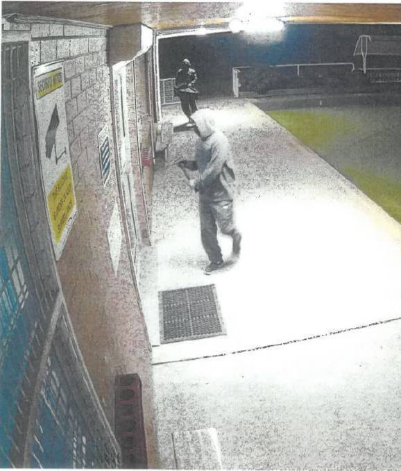JAILED: Brent Henderson and Joel Shoesmith caught on camera about to smash their way into Abermain Bowling Club. 