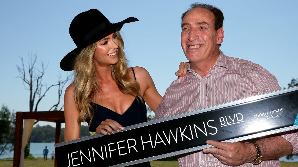 DRAWCARD: Trinity Point Ambassador Jennifer Hawkins with developer Keith Johnson at the development's open day in October 2014. Picture: Jonathan Carroll.