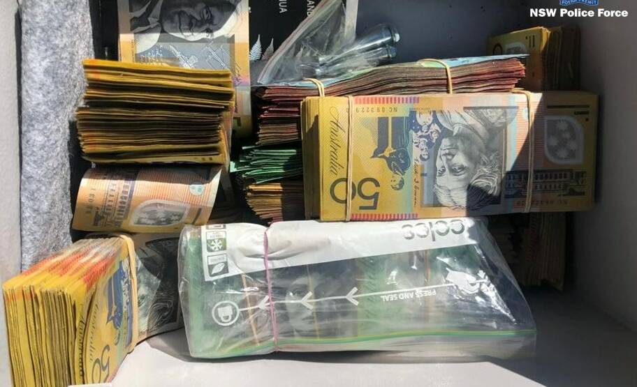 CASH: After Norton's arrest, police raided properties at Windale and Belmont and a storage unit in Belmont, where they seized nearly $180,000 in cash. 