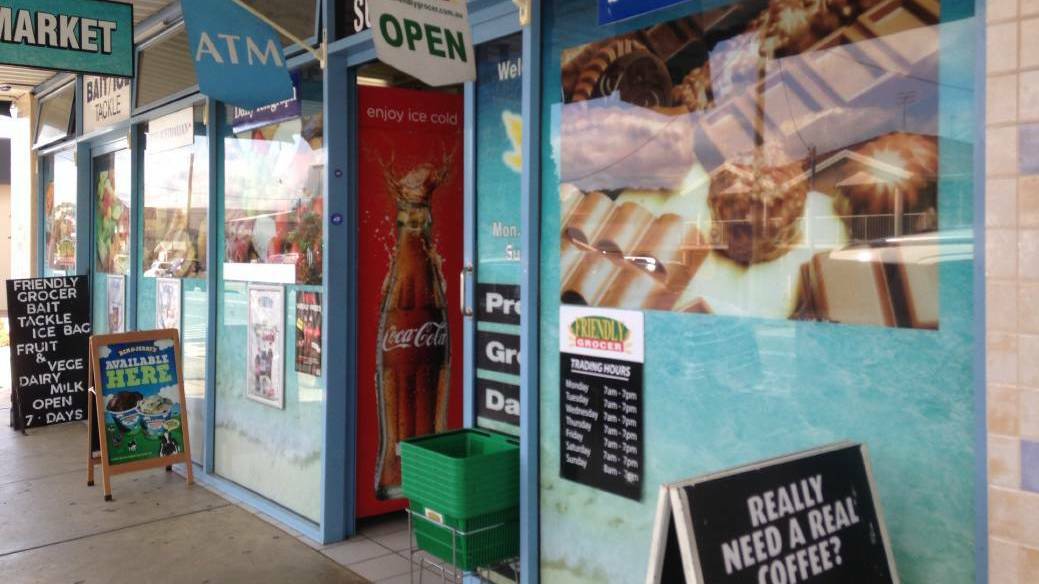 CONFRONTING: Salamander Bay's Friendly Grocer where members of the public locked a woman inside during a stabbing spree last week. The woman applied for bail on Thursday, but it was refused. 