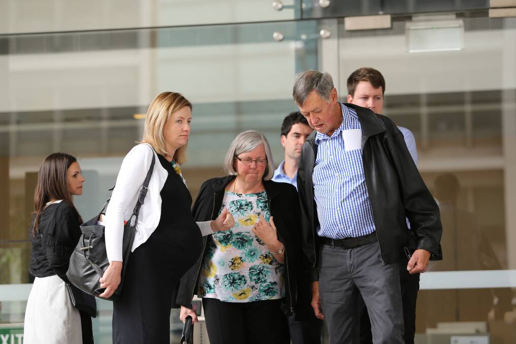 GRIEVING: Christopher Daunt's sister, Katherine, his mother, Denise, his father, John, and his brother, Tom, outside Newcastle courthouse on Friday. Picture: Peter Lorimer 