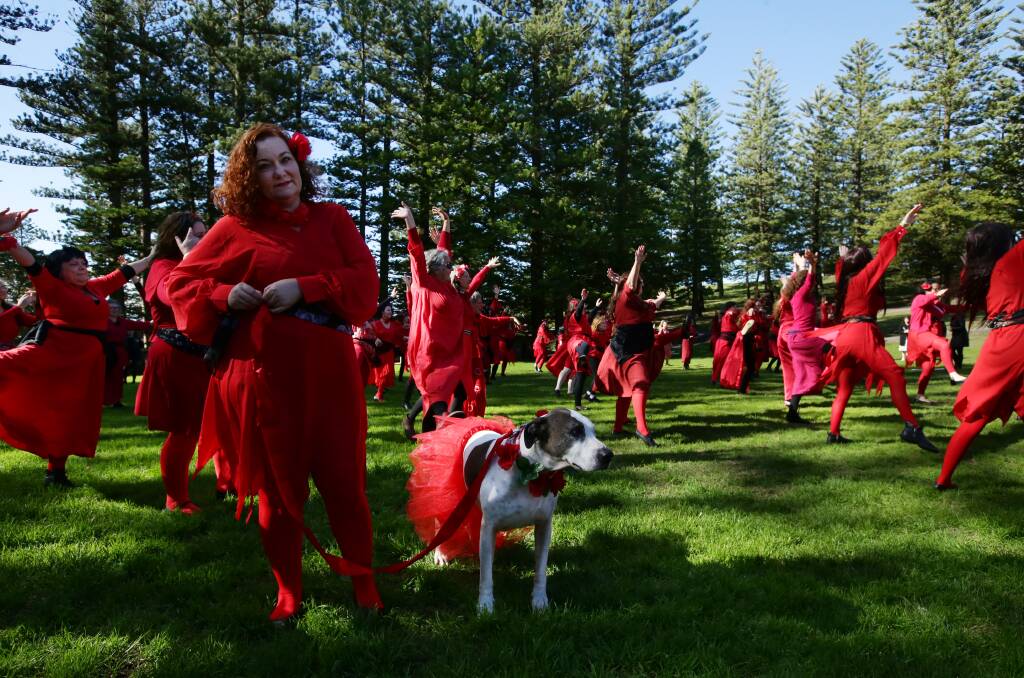 ALL IN RED: The Most Wuthering Heights Day Ever is a worldwide celebration where people dress like Kate Bush and get together to dance like her. Picture: Jonathan Carroll 