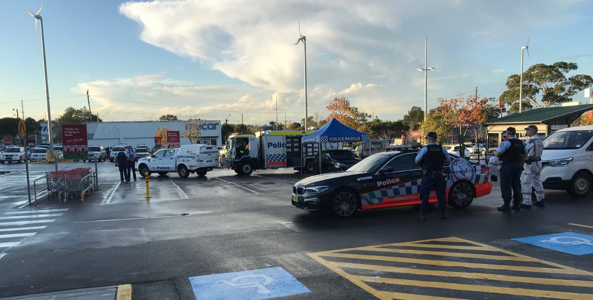 INVESTIGATION: Police set-up a crime scene after the second stabbing in three days at Waratah. 