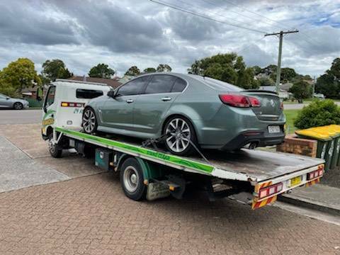Stephen Garland's Holden Commodore is seized by investigators.
