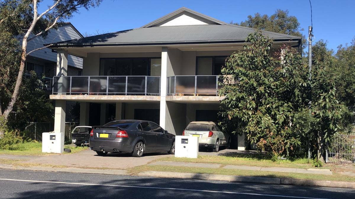SCENE: The Hawks Nest home where two men, aged 53 and 78, were brutally stabbed during a home invasion in June, 2020. Kyle Burkett, his father Mark Burkett and Megan Bowater were jailed for their roles on Wednesday. 