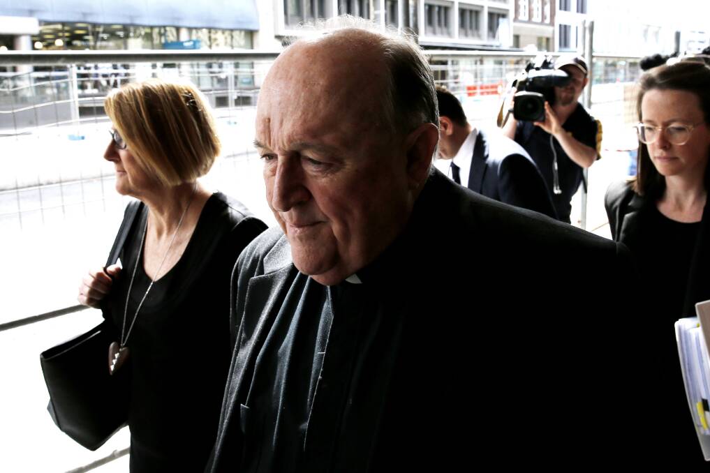 ACCUSED: Adelaide Archbishop Philip Edward Wilson leaving Newcastle courthouse on Tuesday after his defence made a 'no case to answer' application at the conclusion of the prosecution case. Picture: Darren Pateman/AAP 