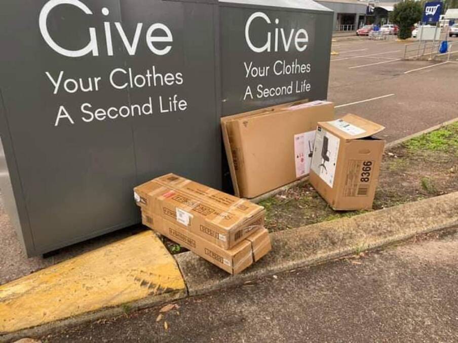 GRUBS: As well as rubbish, someone dumped a number of cardboard boxes at the back of the bins. Newcastle police have been notified. Picture: Sonia Hornery 