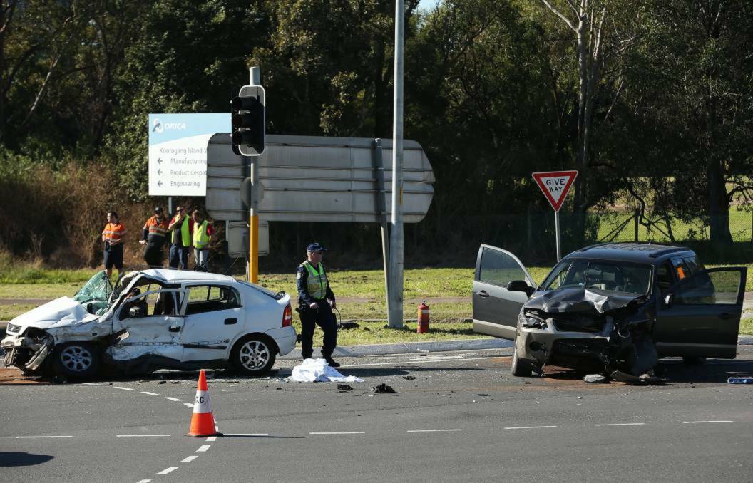 TRAGEDY: The aftermath of the crash on the corner of Industrial Drive and Tourle Street at Mayfield on July 24 last year. Gwenneth Margaret Downey, 65, was killed when Andrew Wayne O'Kane ran a red light. Picture: Simone De Peak
