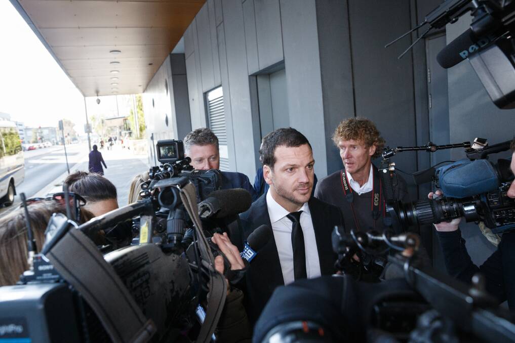 NOT GUILTY: Jarrod Stephen Mullen surrounded by media after leaving Newcastle courthouse on Thursday. He has pleaded not guilty to four drug supply offences. Picture: Max Mason-Hubers
