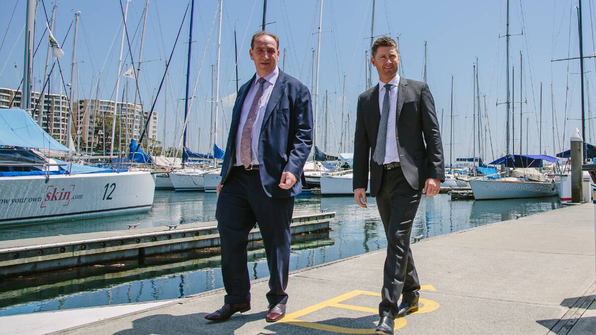 DONE DEAL: Johnson Property Group CEO Keith Johnson with new Trinity Point ambassador Michael Clarke. Picture: Supplied. 