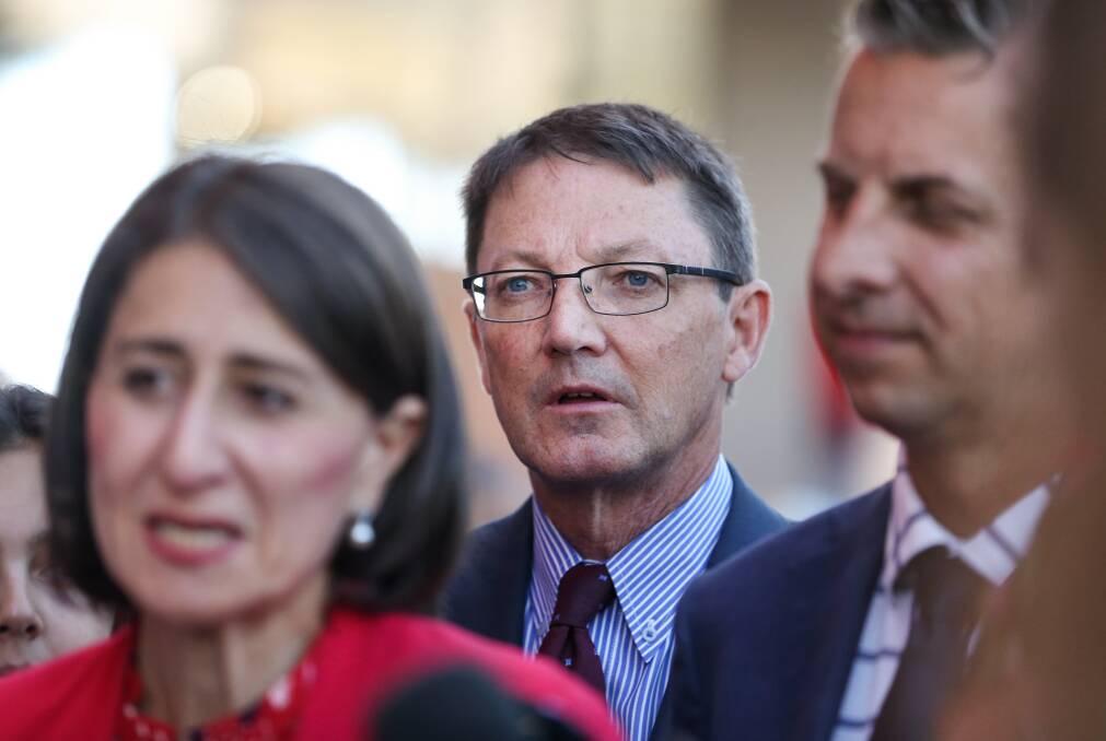 Scot MacDonald, centre, is the state Liberal Party's former parliamentary secretary for the Hunter